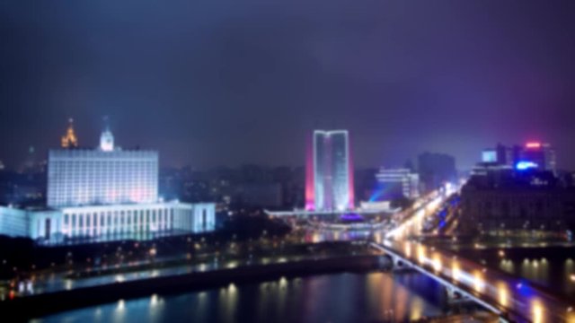 Gimbal blurred timelapse night shot of House of the Government of the Russian Federation in Moscow in autumn day. Night timelapse of night top shot of House of the Government