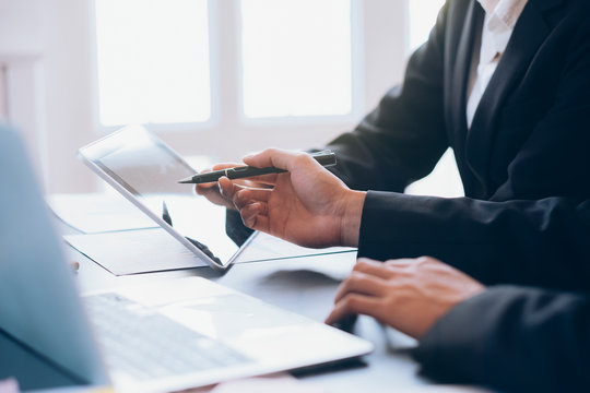 Young startup businessmen teamwork brainstorming meeting to discuss the new project investment.