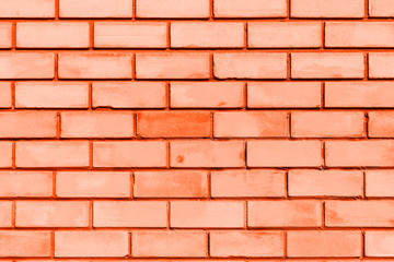  brick wall as a template for design. Orange toned trendy concept, space for text. Textured background
