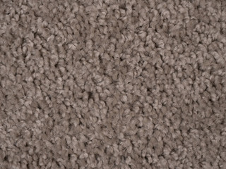 Macro closeup soft beige carpet rug texture