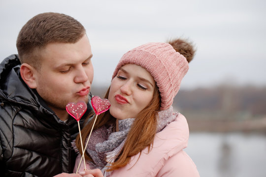 couple with lolipops
