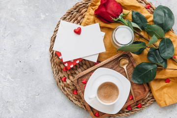 Flat Lay ValentineÕs  concept,  coffee cup, rose and a gift. Top view, flat lay
