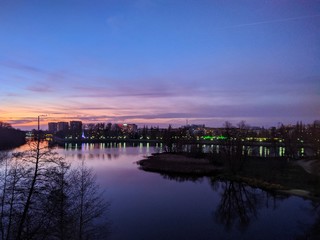 Obraz premium sunset over the river