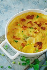 Homemade scalloped potatoes/ Potato gratin close up, selective focus
