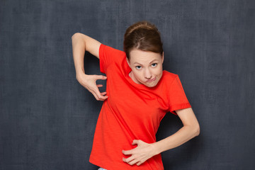 Portrait of funny girl with goofy expression fooling around