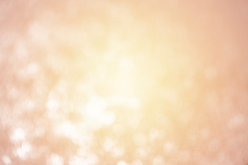 Abstract bokeh light on black background with flare. Christmas concept to present celebration wallpaper decor with beautiful glitter and sparkle bubbles in blur or defocus style for web design.