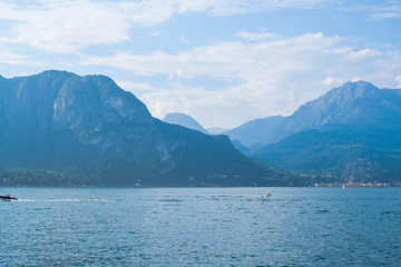 Mountain landscape with Como Lake or Lago di Como, popular tourist attraction in Lombardy, Northern Italy.