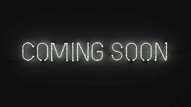 COMING SOON neon sign on dark background