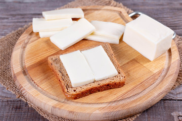 Preparing toast with cheese