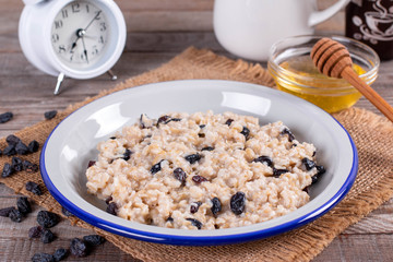 Bowl of oatmeal with raisins