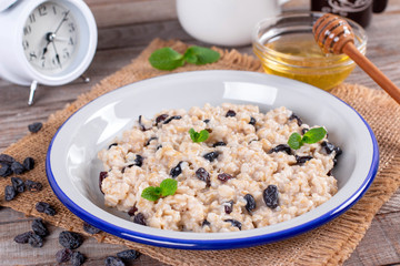 Bowl of oatmeal with raisins