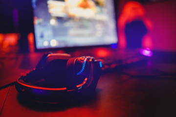 Headphone backlit for video gamer computer esports in internet cafe