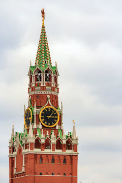 Spasskaya Tower (Saviour Tower) is  main tower on eastern wall of Moscow Kremlin which overlooks Red Square. Kremlin star and clock. Ancient Kremlin is the main landmark of Moscow.