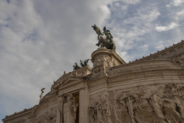 Fototapeta na wymiar Statue of rider and horse overlooking downtown Rome, Italy
