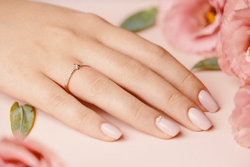 Fototapeta premium Ring on woman finger.