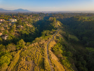 Aerial view of Campuhan Ridge Walk, Quiet morning scenic Green Hill in Ubud Bali, Indonesia