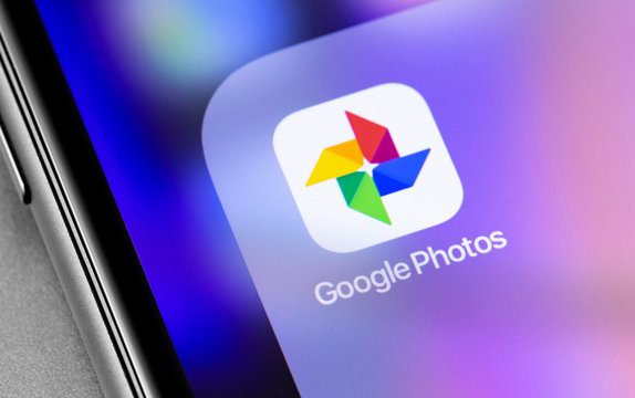 Google Photos icon application on the screen smartphone. Google Photos - a service designed to store, edit, share photos and videos. Moscow, Russia - November 25, 2019