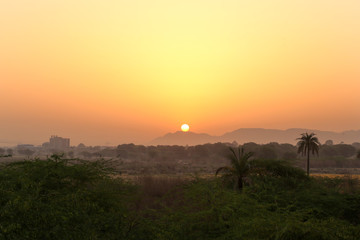 Obraz premium sunset over the field