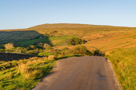 Rural road in the Yorkshire Dales between Gawthrop and Barbon, Cumbria, England, UK