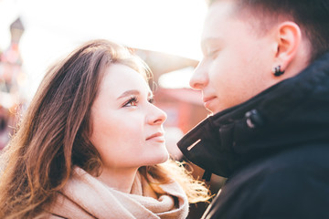 Loving couple looking at each other on the street