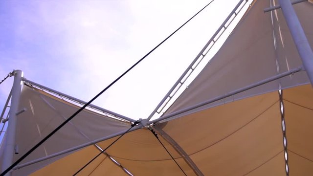 waterproof, sag, material, shiny background, shining, glare, pulling rope, tension, light architecture, architecture, architectural form, cable, rope, reflection, outdoors, sea air, fresh air, open sp
