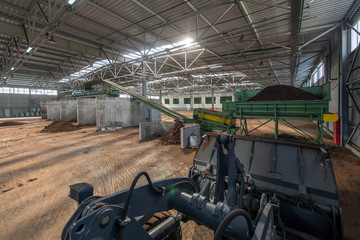 Fototapeta premium loading of peat raw materials, at the processing plant