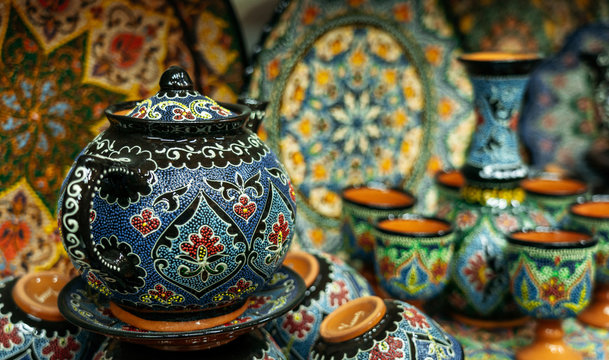 Ethnic Uzbek ceramic tableware with traditional uzbekistan ornament.