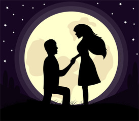 silhouette of lovers in the moon