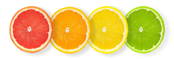 Group of fresh citrus fruits cut in half (grapefruit, orange, lemon, lime) in a row isolated on white background (mixed)