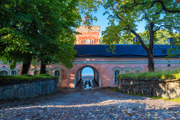 Helsinki. Finland. Cobblestone road leads to the Baltic sea. The Fortress Of Suomenlinna. The...
