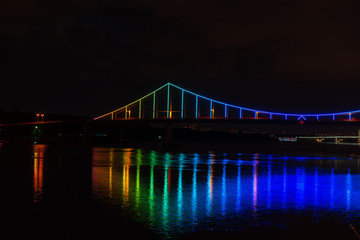 Fototapeta na wymiar Night view of bridge on Dnipro in Kiev Ukraine