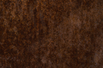 rusty surface of an old door
