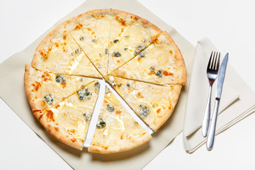 Pizza with chicken and broccoli on a white plate and on a white background