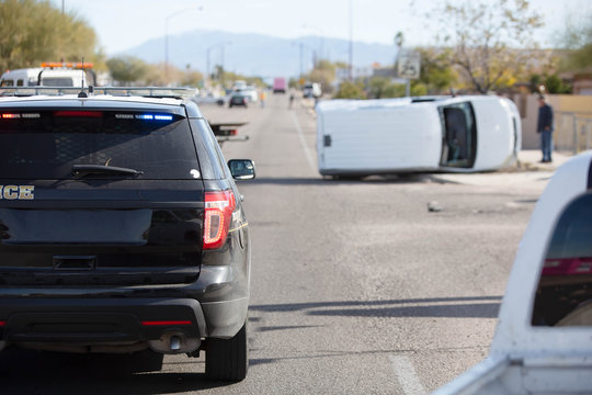 Police Car At Vehicle Rollover