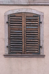 closed wooden window blind of a house