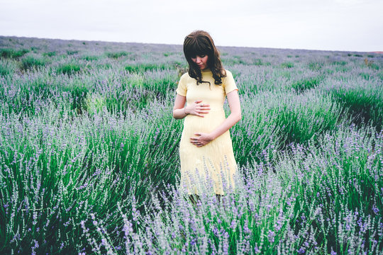 Lovely young woman in her first month of pregnancy