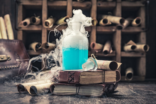 Vintage alchemist laboratory with unique scrolls and manuscripts