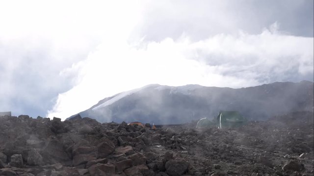 Time lapse shot, at the campsite of mount Kilimanjaro, scenic view of Kibo peak in the background.