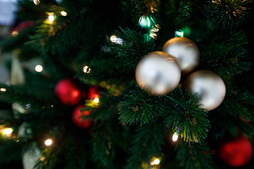 Naklejka na ściany i meble christmas tree with ornaments and lights