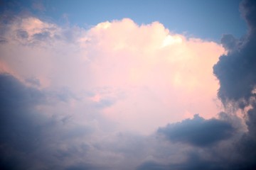 Blue sky with clouds and sun reflection in water with place for your text. anazing clouds, mist in the sky