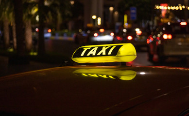 Taxi Cab Sign at Night