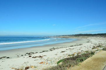 Picturesqe Monterey Peninsula in California, USA. Scenic drive between Monterey and the quaint town of Carmel winds along the ocean on one side and upscale homes and golf courses on the other.