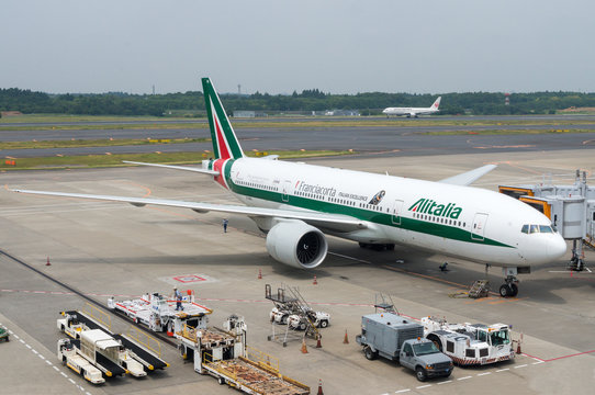 An Alitalia Plane On Tarmac At Narita Internation Airport