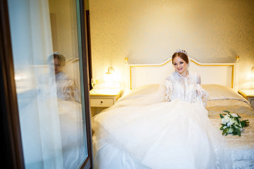 Beautiful bride dresses her white wedding dress