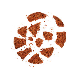 Broken chocolate cookies with crumbs on a white background