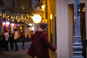 People at night on the streets of the Old Town of Bucharest, Romania, 2020