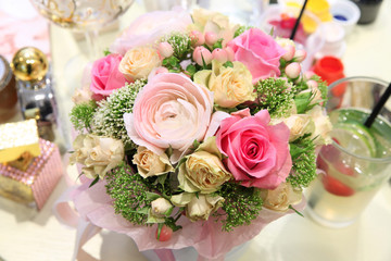 Gently pink Ranunculus in a delightful bouquet of flowers
