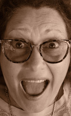 a close up portrait of an adult woman making faces expressions of happiness, surprise and serious