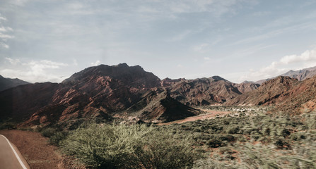 road with a mountain in the landscape background in a sunny day of summer