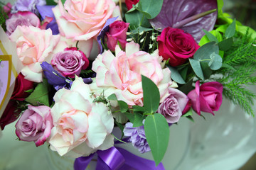 Colorful flower bouquet of pink roses of different colors